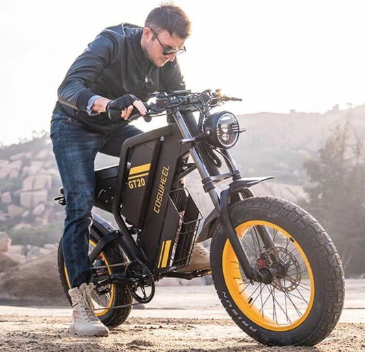Rider tackling a rugged hill on a GT20 electric powered dirt bike alternative with 20-inch fat tires