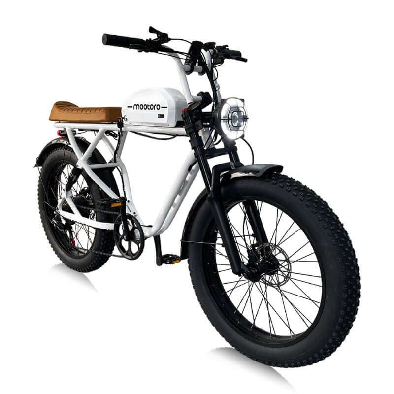 Leatherette seat and aluminum frame of a 1000w vintage style electric cafe racer with 24 inch tires.