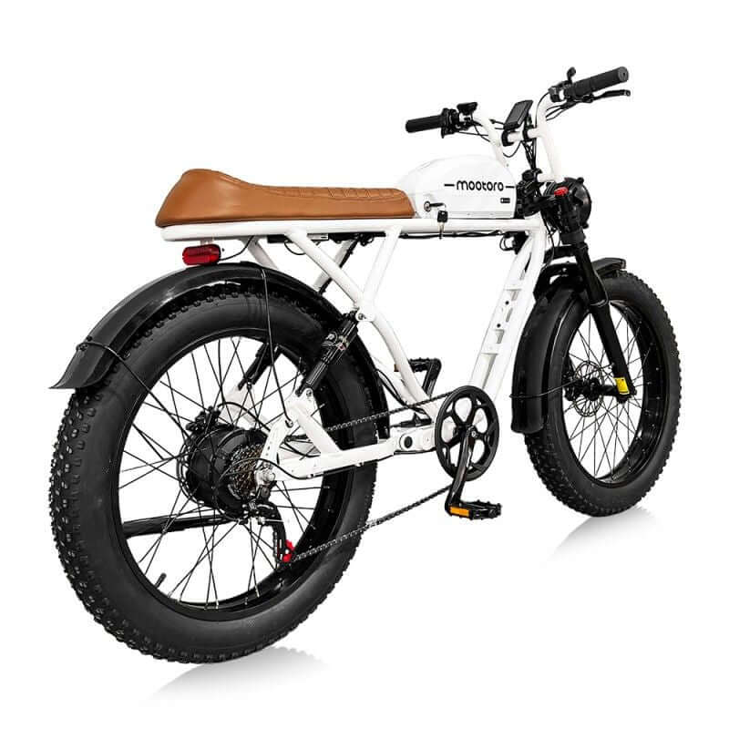 1000W brushless motor on a 1000w vintage style electric cafe racer with 24 inch tires.