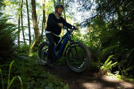 Side profile of the 26 inch step over electric mountain bike blue color with aluminum frame